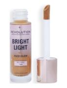 Revolution Bright Light Face Glow Radiance Tan Meikkivoide Meikki Make...